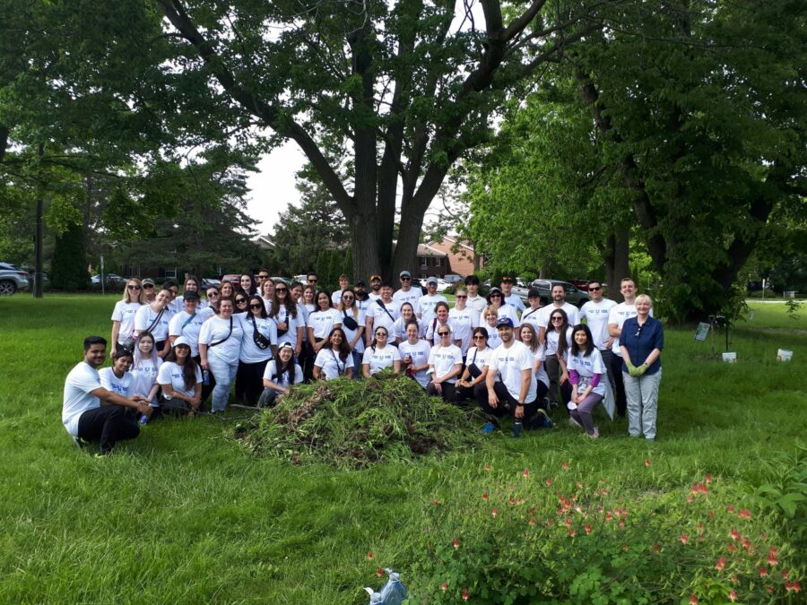 Unilever volunteers at King and John on June 8, 2022, with their harvest of weeds.