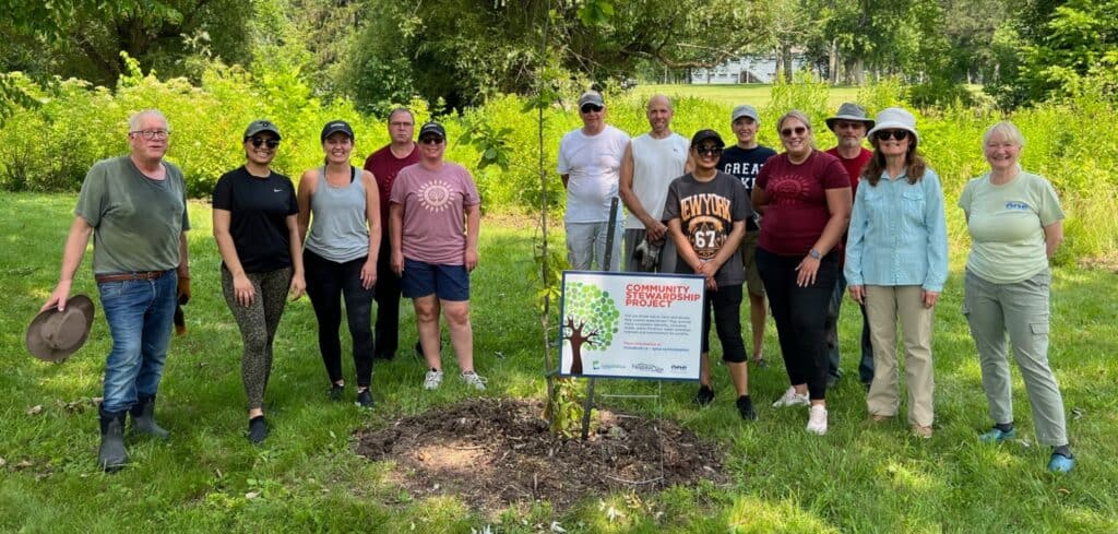 Volunteers from SunOpta and FOMC for weeding at King and John July 14 2023.