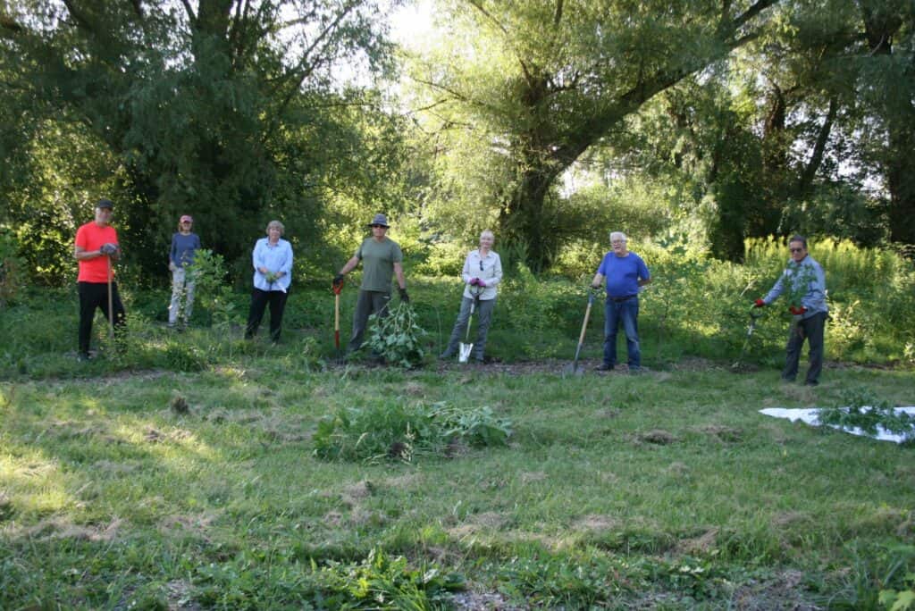 John Venables, Kathy Goulding, Beckie Fox, Viggo Zing, Klara Young-Chin, Michael Fox and Nigel Young-Chin of the Friends of One Mile Creek spent a morning doing a good weeding of the area they planted last year. (photo by Mike Balsom)